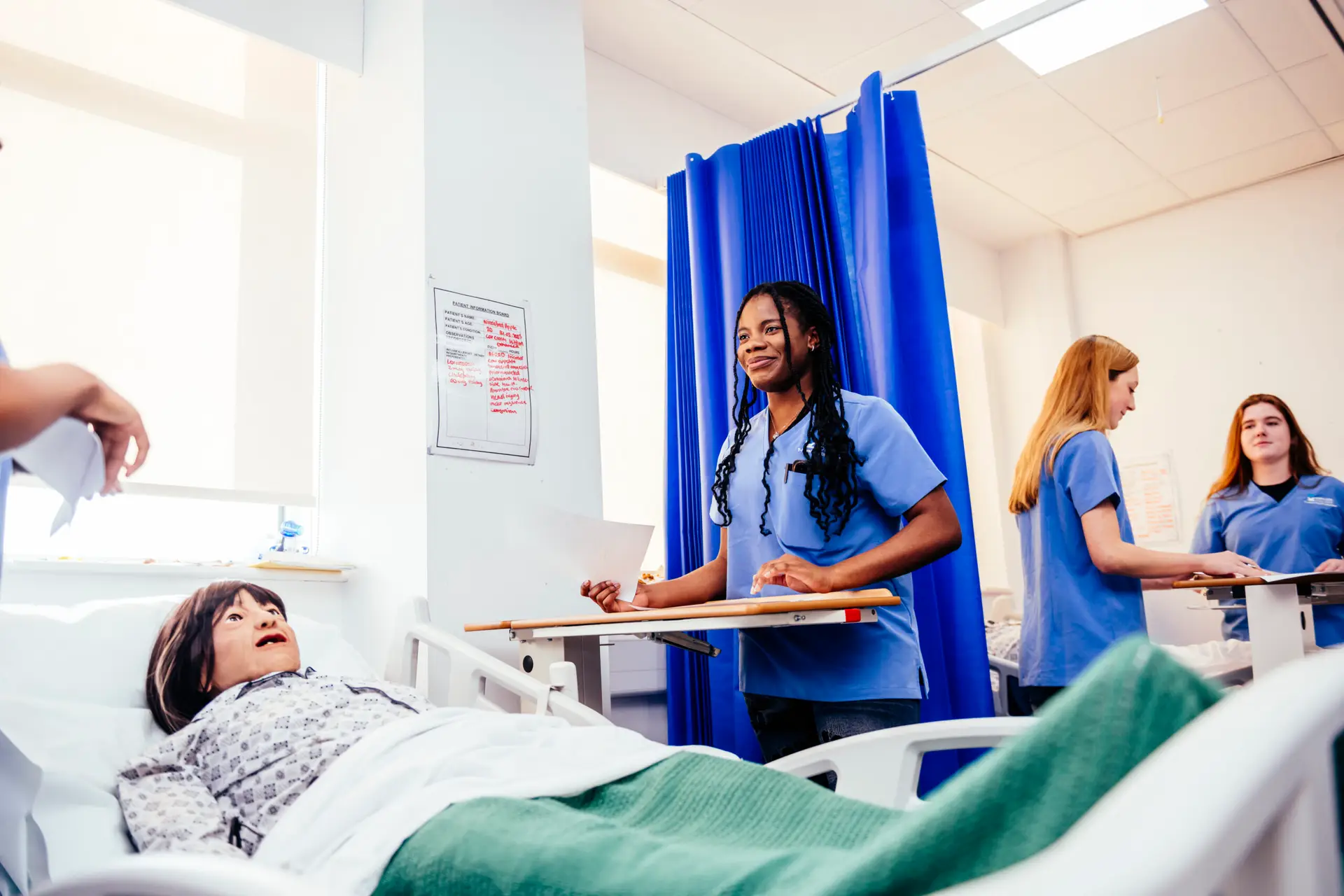Health students in mock hospital ward