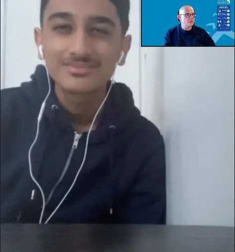 video call in between young boy and teacher