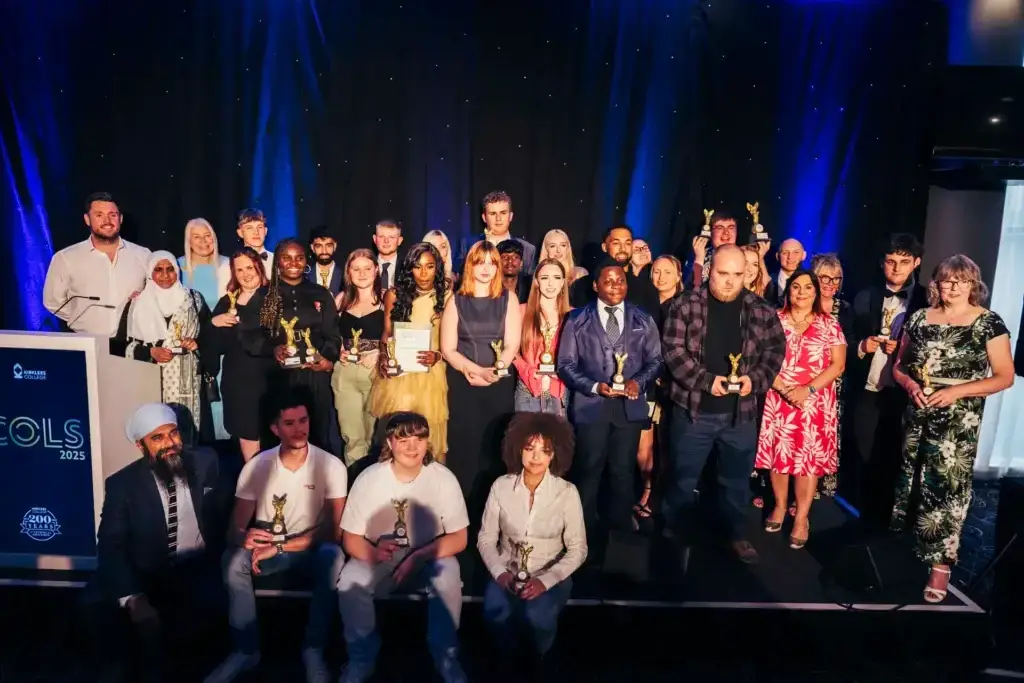 Student winners at the 2025 College Ourstanding Learner Success Awards line up on stage