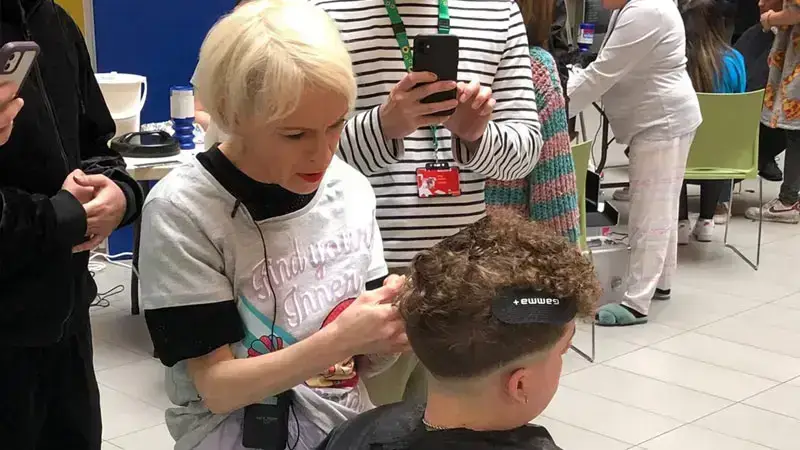 lady doing hair cutting