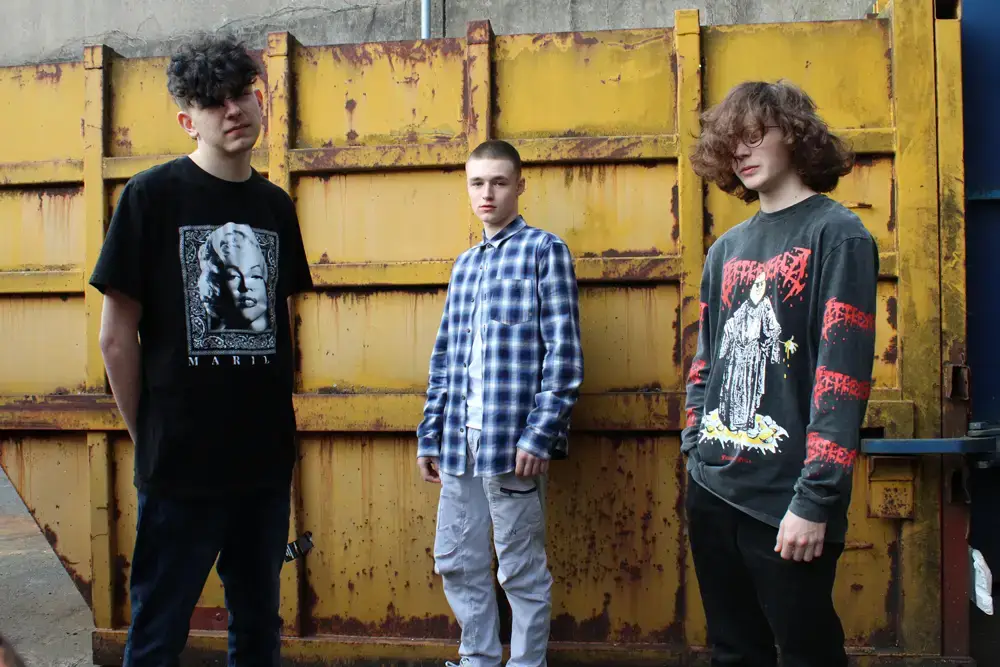 3 boys standing for photoshoot