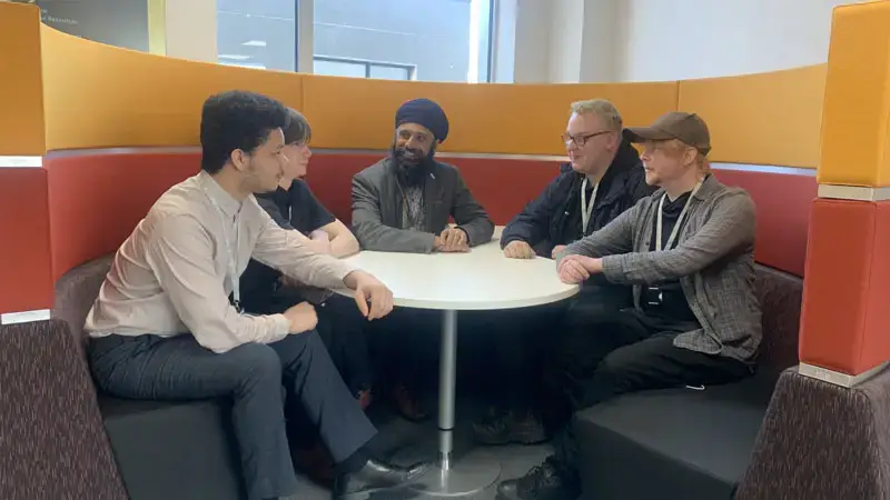 meeting on rounded white table