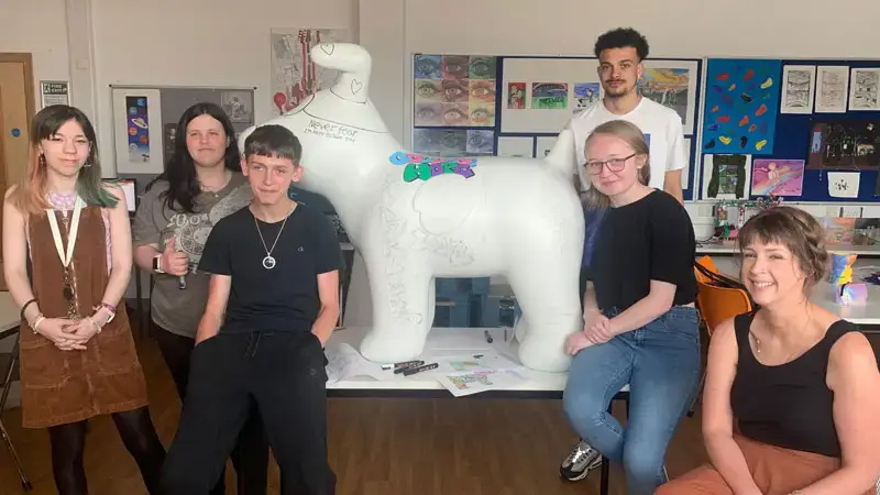 Snow dog made by 6 students