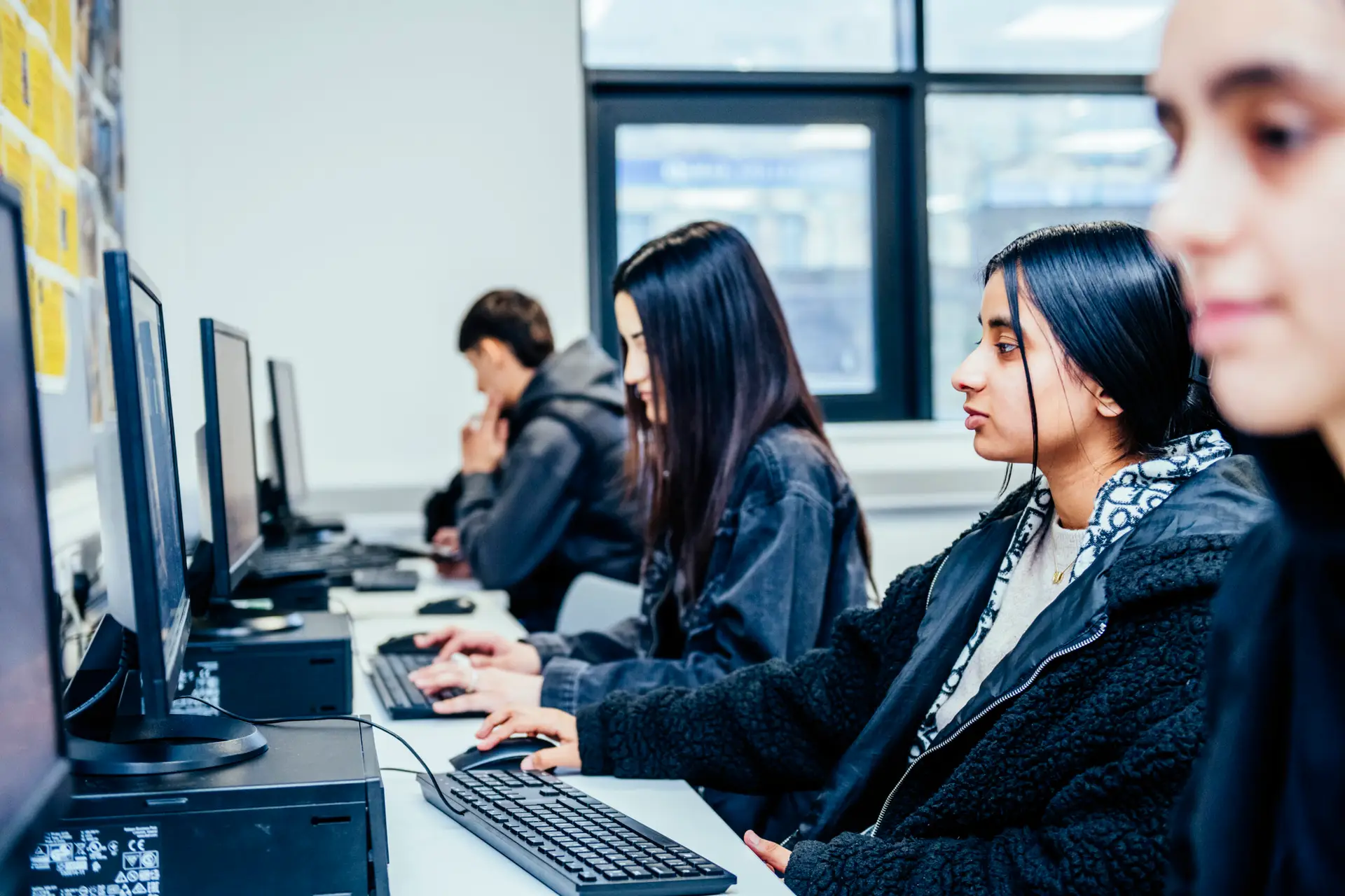 Business students working on computers