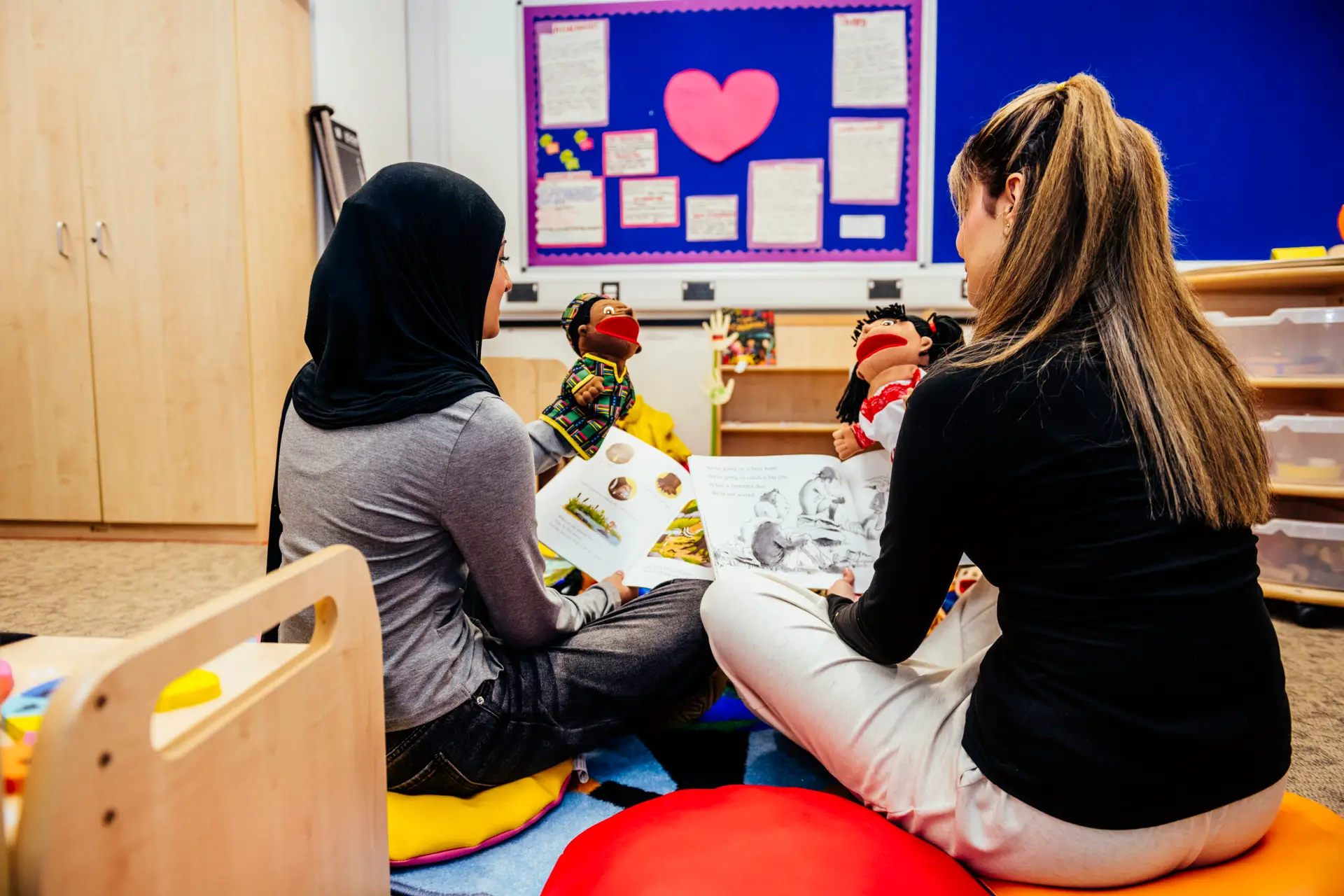 Early Years students reading