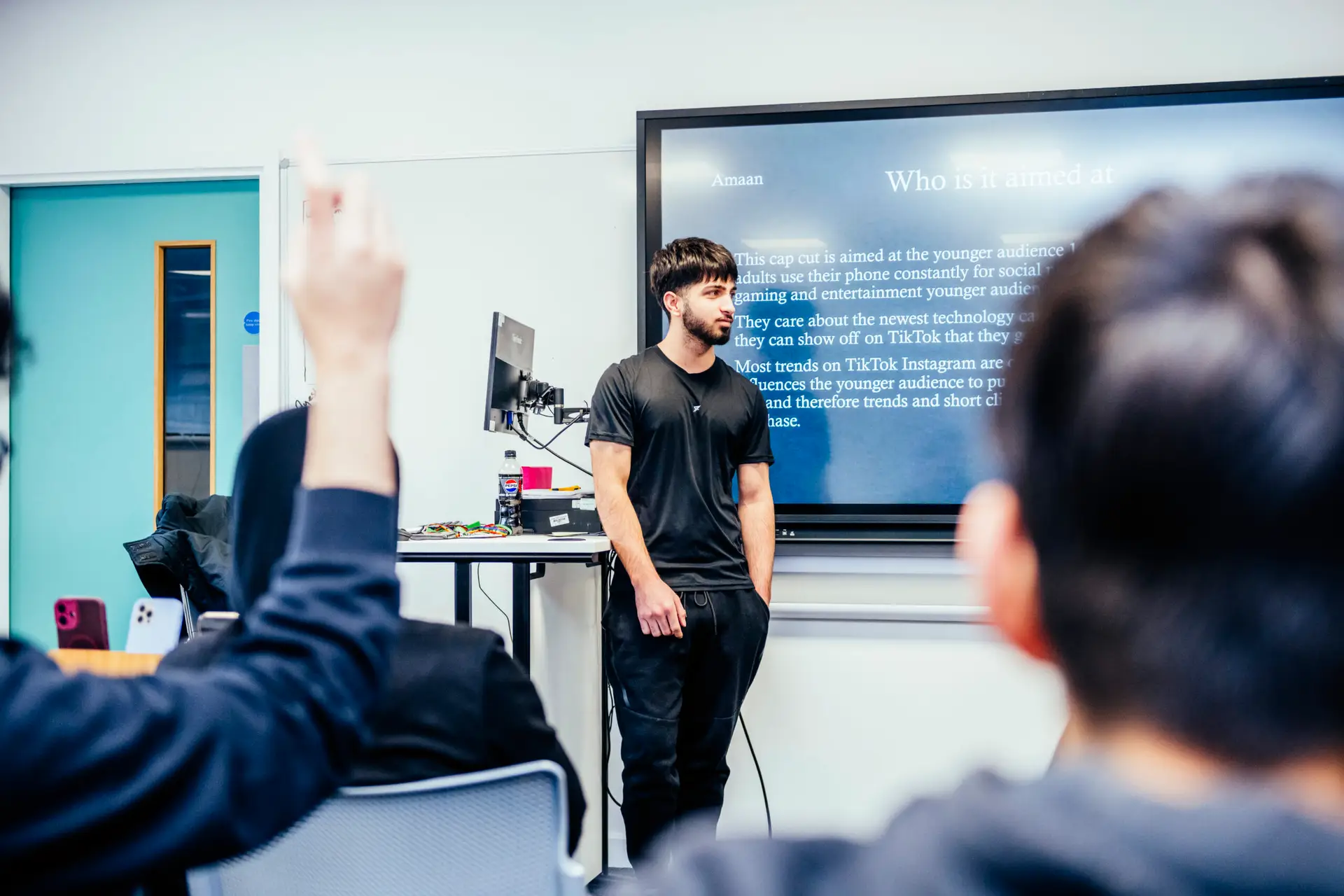 Student presents to his class