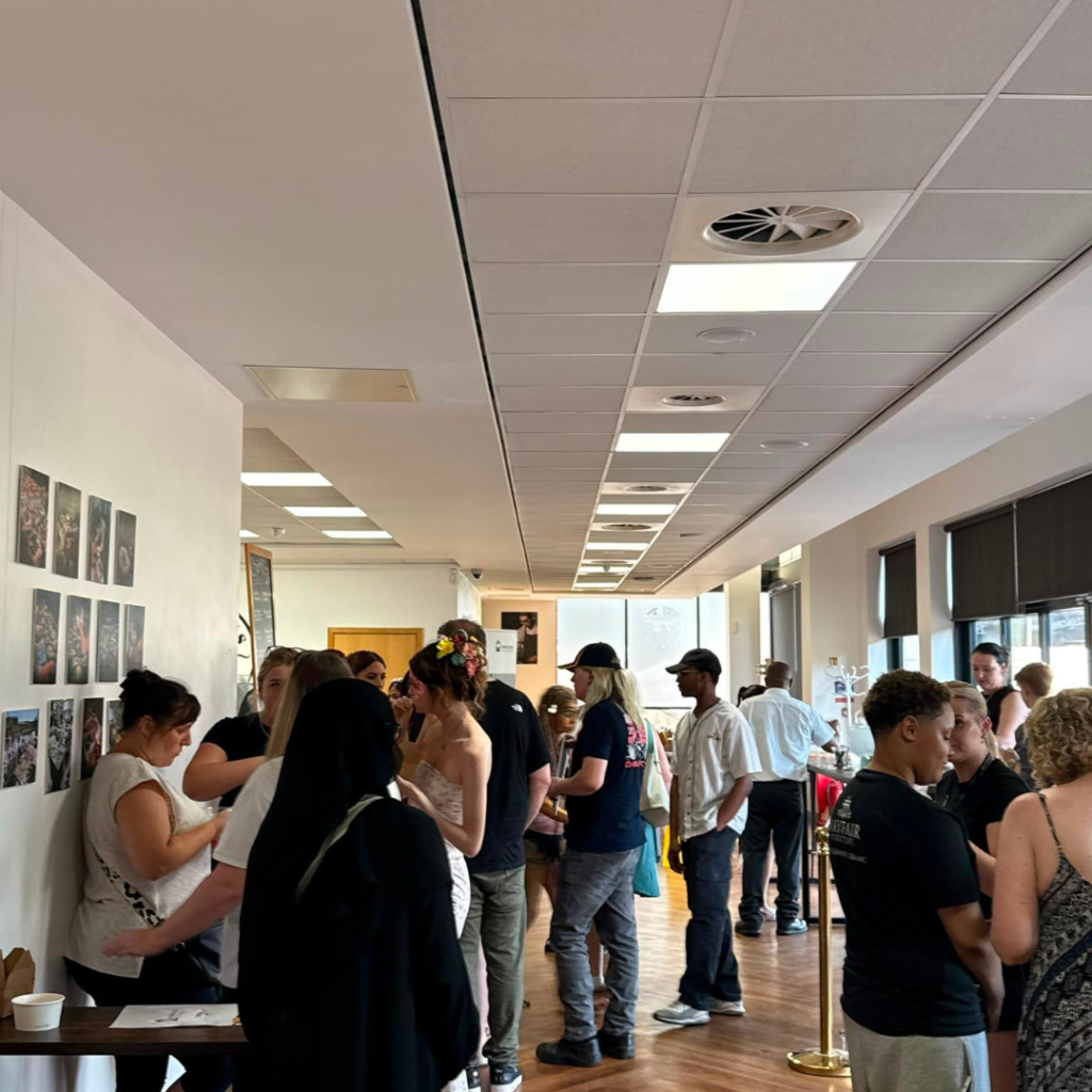 people attending create exhibition