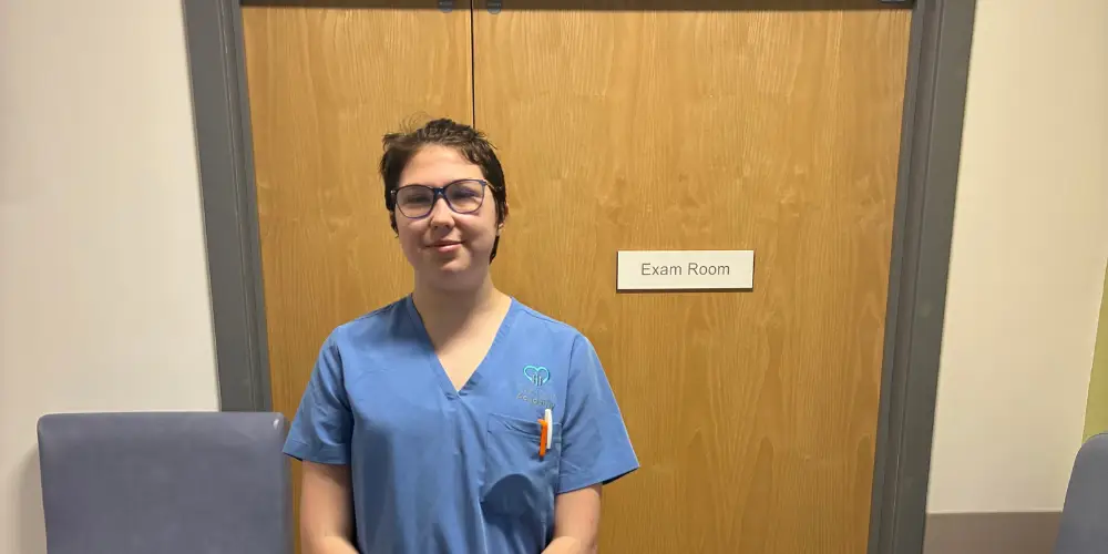 health and social care student poses for picture whilst on placement