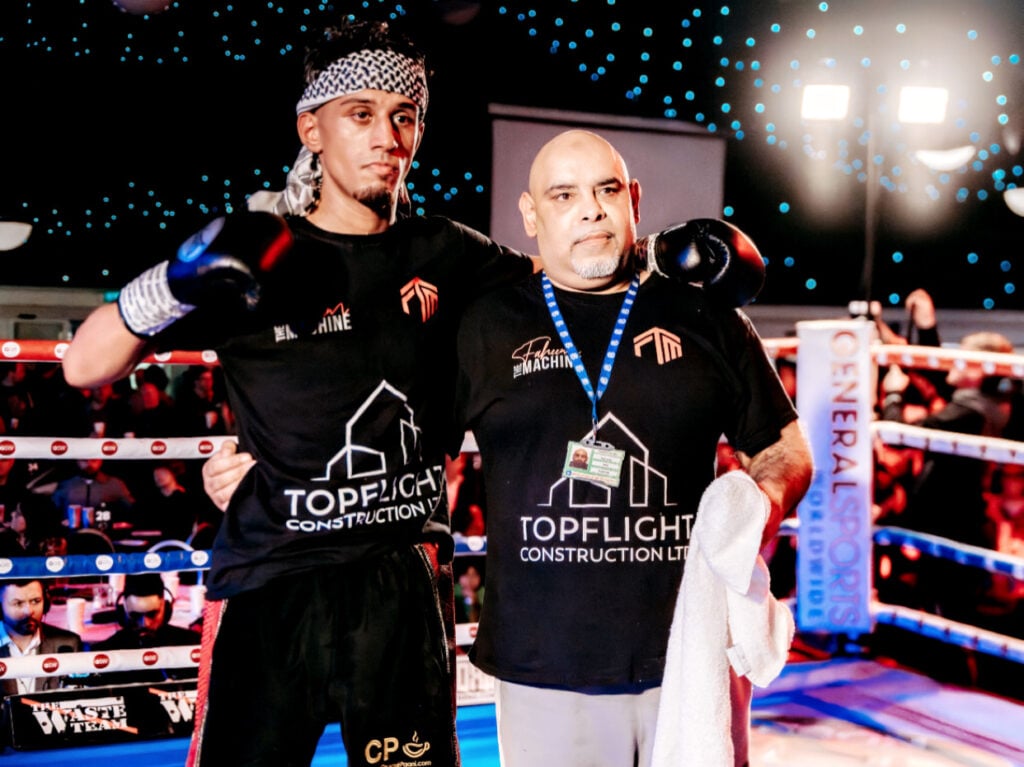 faheem in boxing ring with coach