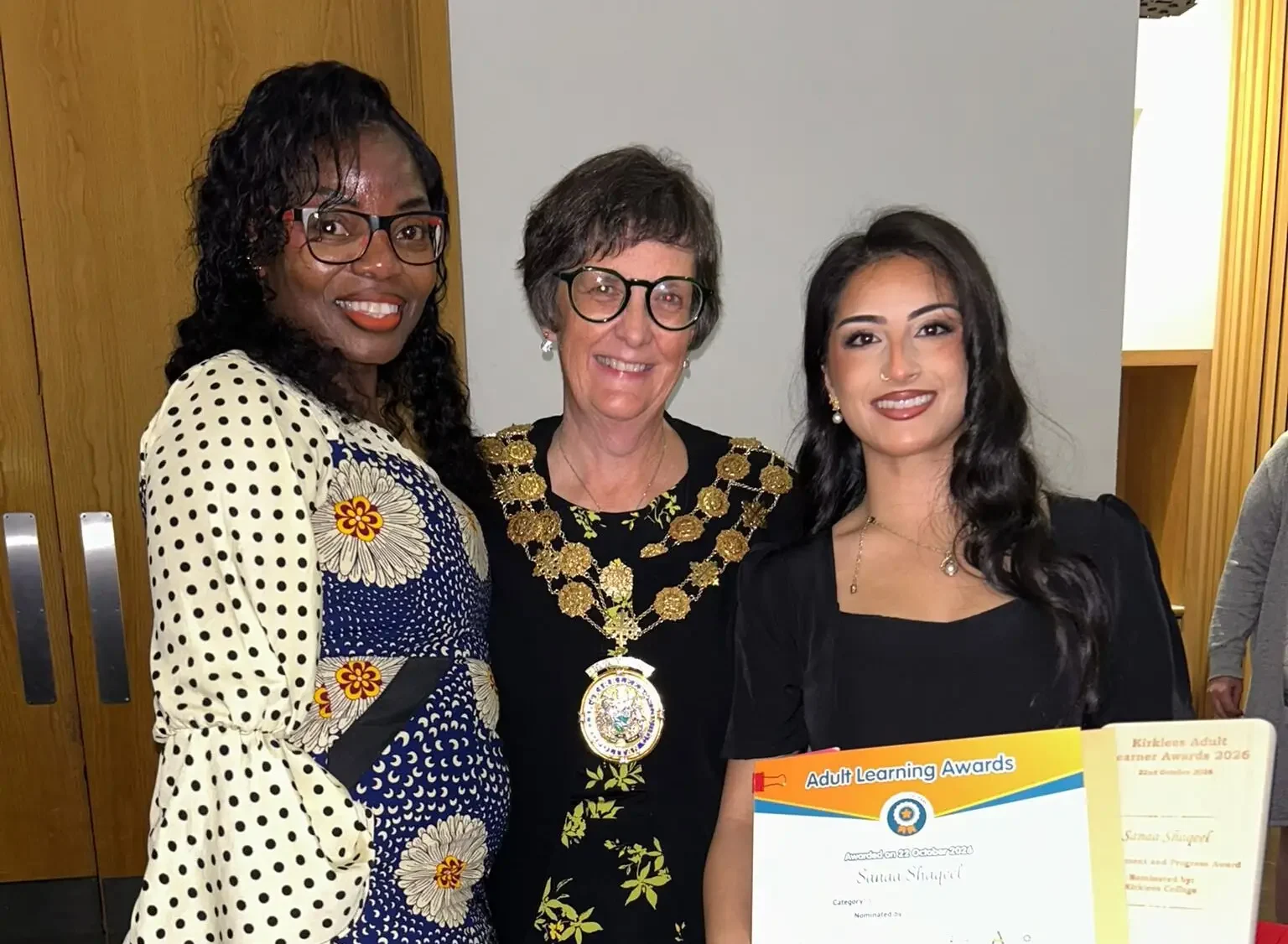 sanaa shaqeel presented with award